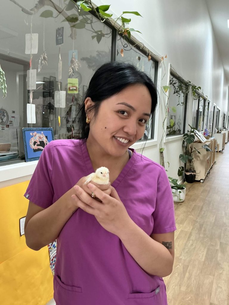 Andrea holding a chick