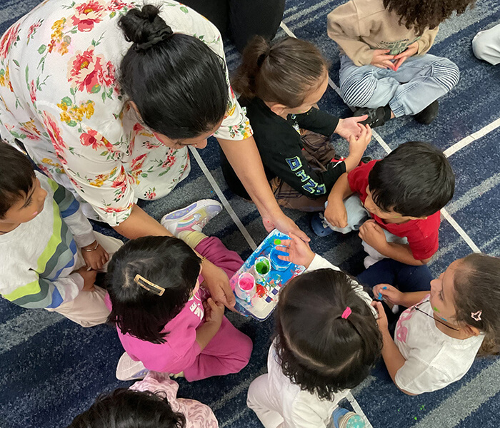 children educators paint color